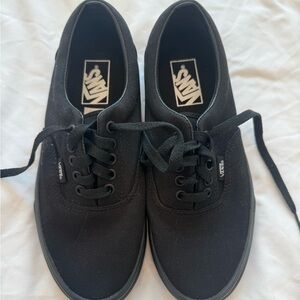 All black vans 
Women size 8.5
Men size 6.5